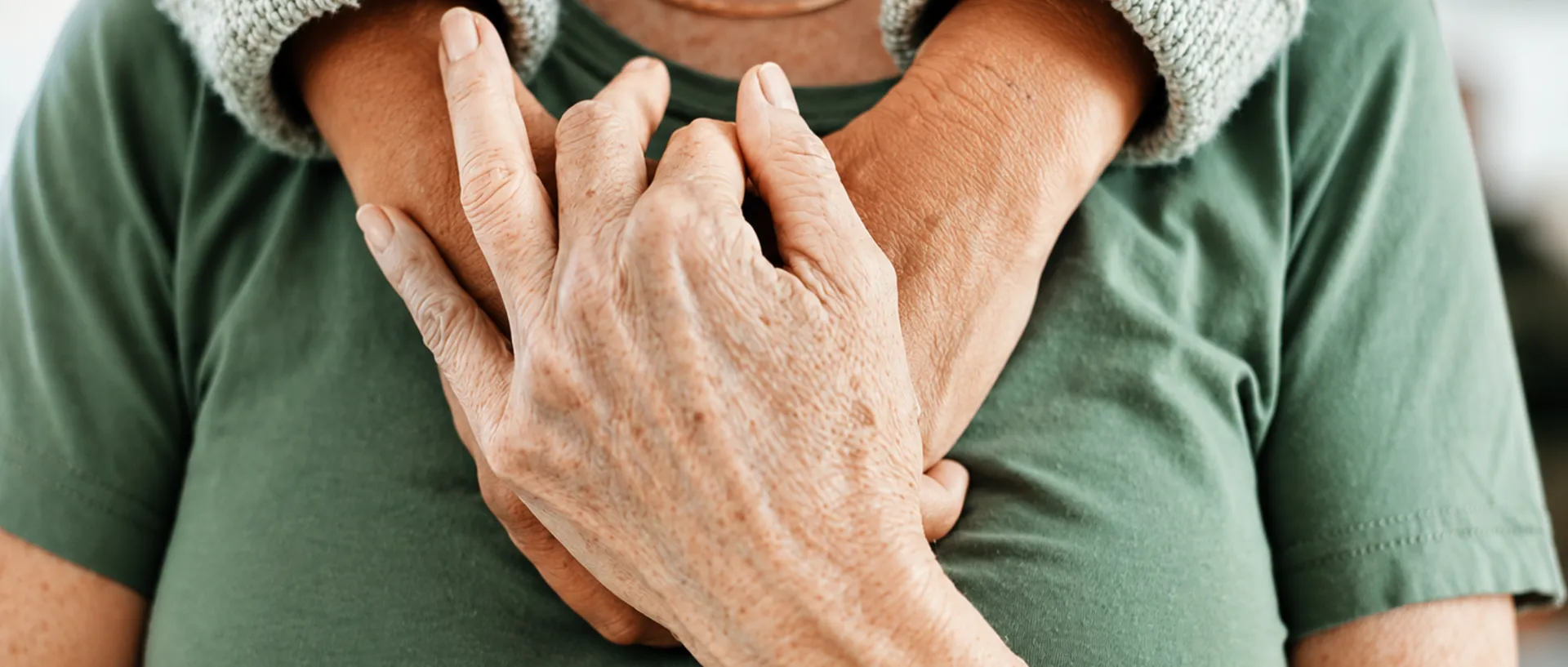 Supportive hands in a comforting embrace
